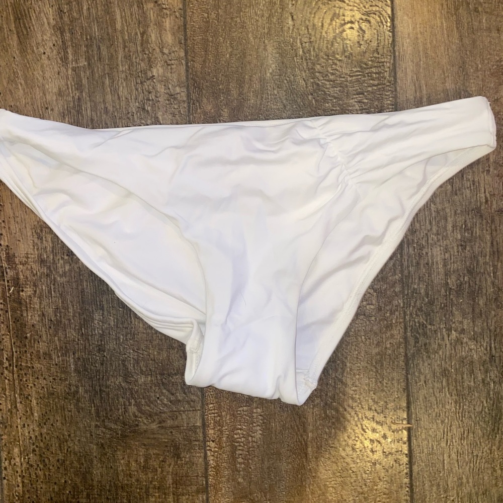 NWT. Victoria Secret Pink peace sign bikini bottoms. Size M.